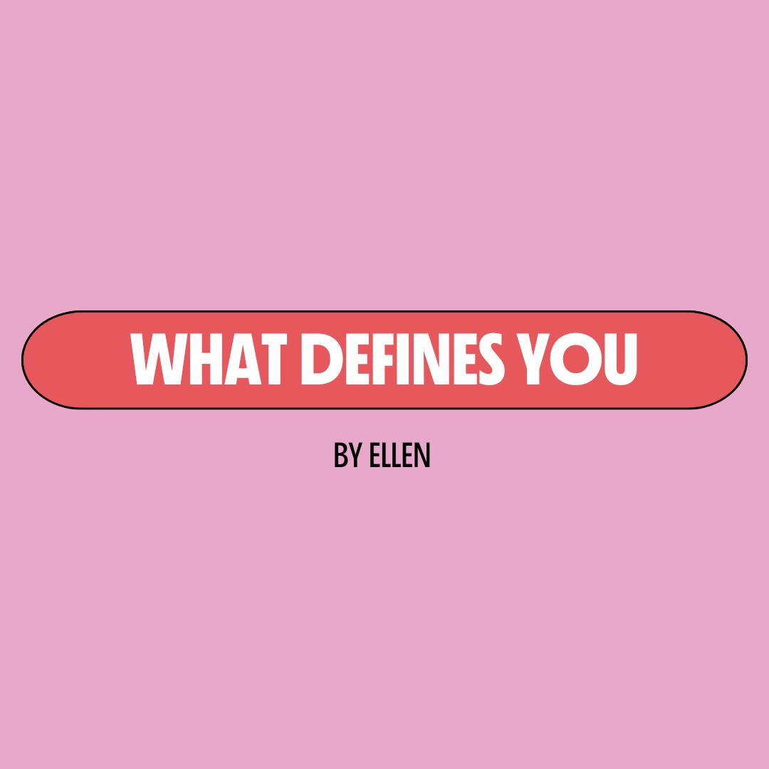 Pink background with a red text box containing white writing that reads: "what defines you." Underneath is black writing that reads: "by Ellen."