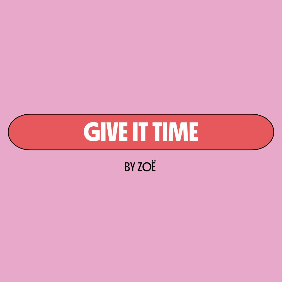 Pink background with a red text box containing white writing that reads: "give it time." Underneath is black writing that reads: "by Zoë."