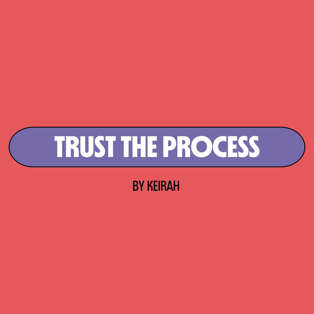 Red background with a purple text box containing white writing that reads: "trust the process." Underneath is black writing that reads: "by Keirah."